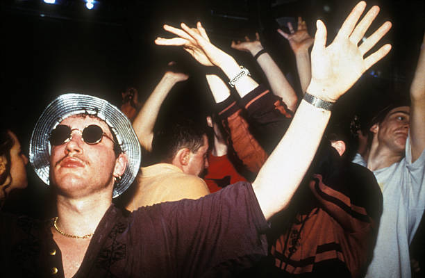 Historic black-and-white photo of a crowd dancing